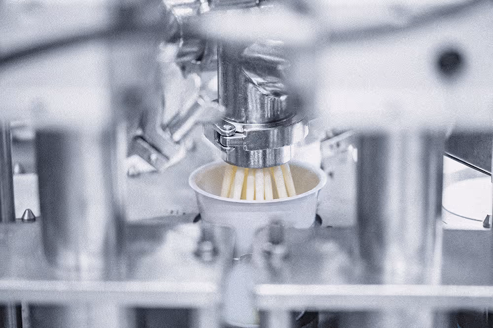 Yogurt pots on a filling line